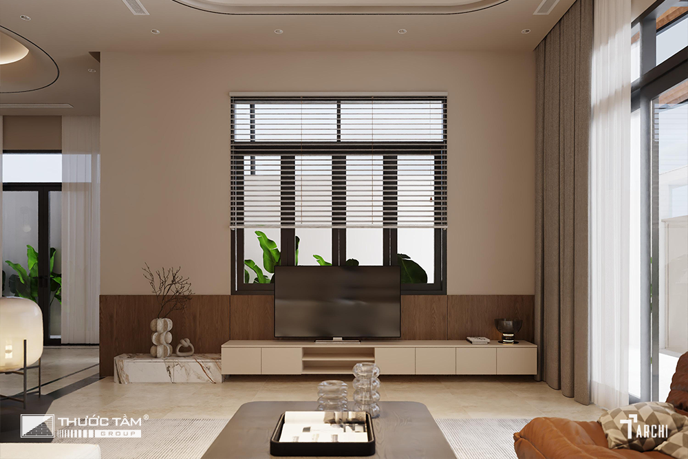 Hệ cửa kính lớn kết hợp rèm hai lớp giúp kiểm soát ánh sáng linh hoạt.